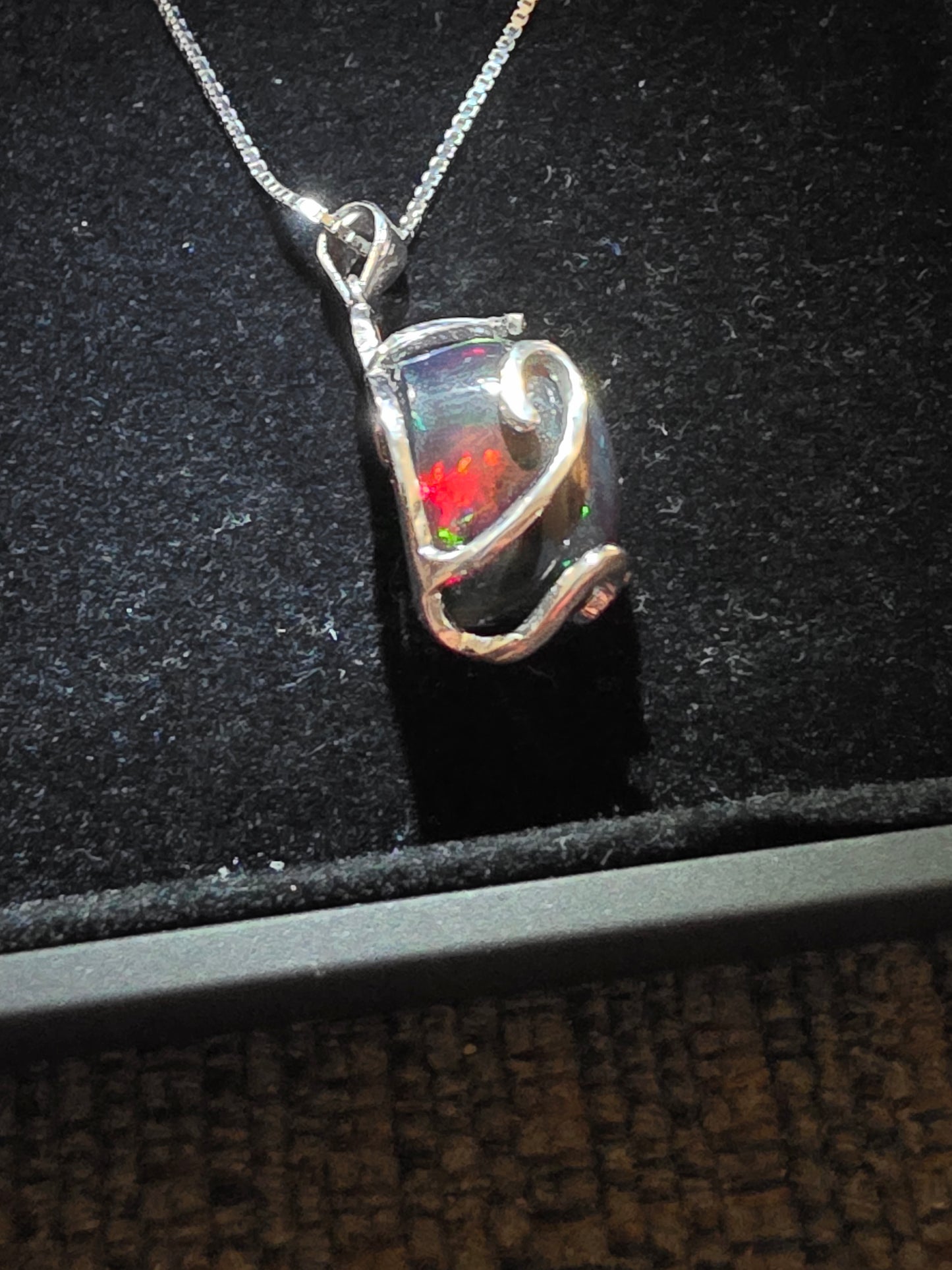 .925 Sterling Silver Necklace with a 7.76 Ct. DARK Ethiopian Opal with a beautiful play of color