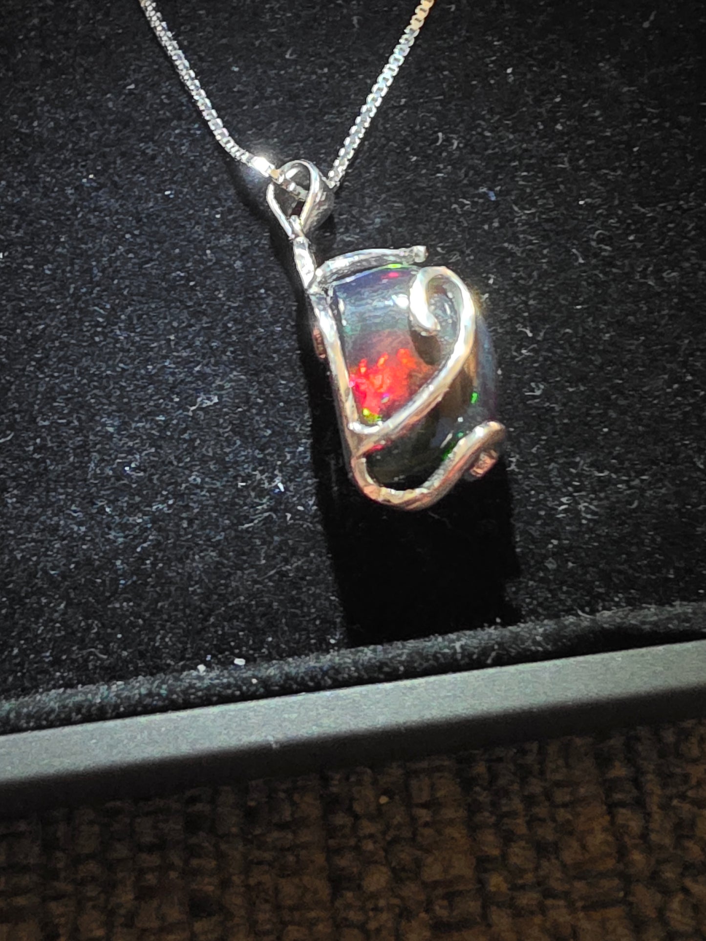 .925 Sterling Silver Necklace with a 7.76 Ct. DARK Ethiopian Opal with a beautiful play of color
