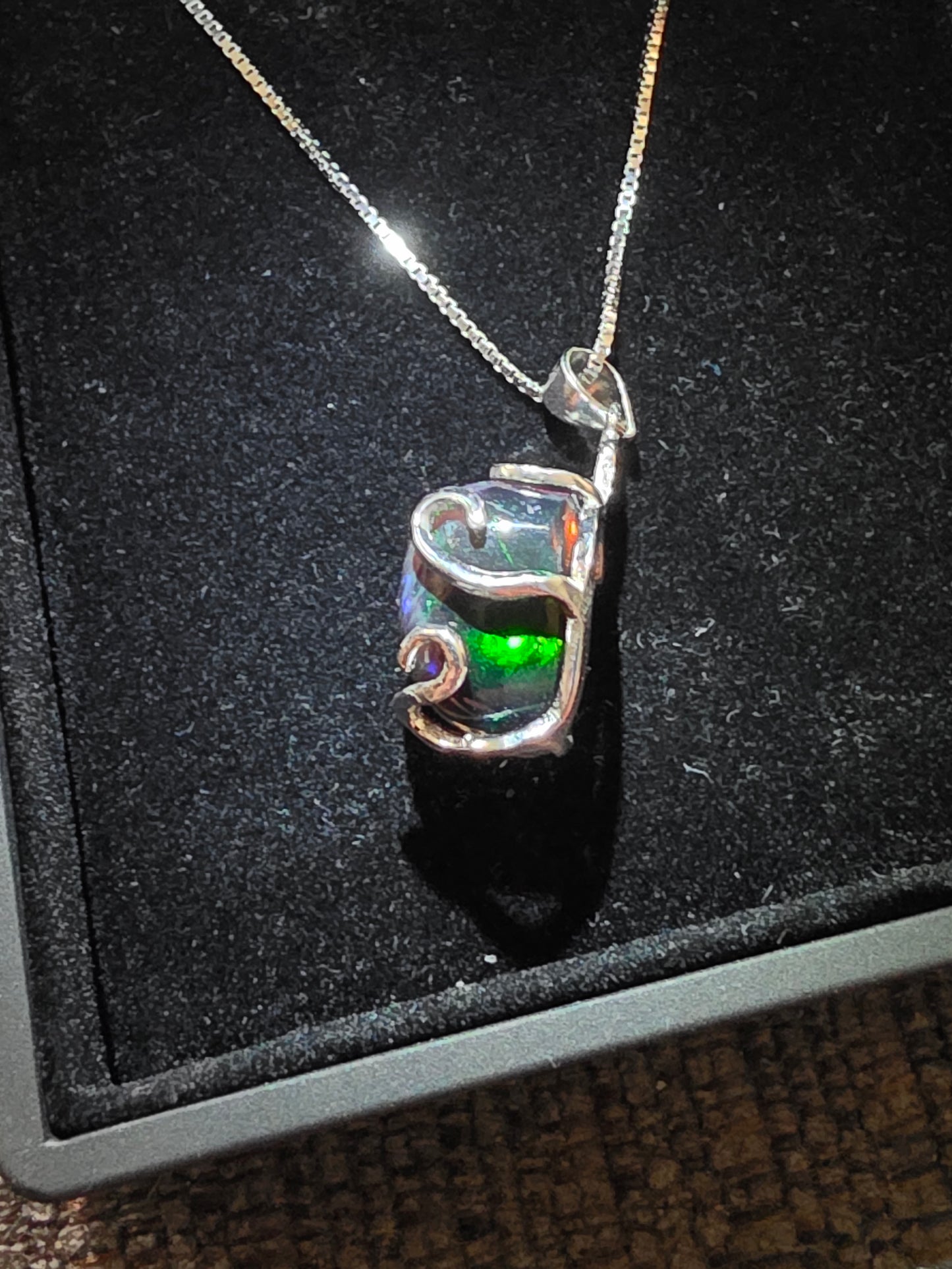 .925 Sterling Silver Necklace with a 7.76 Ct. DARK Ethiopian Opal with a beautiful play of color