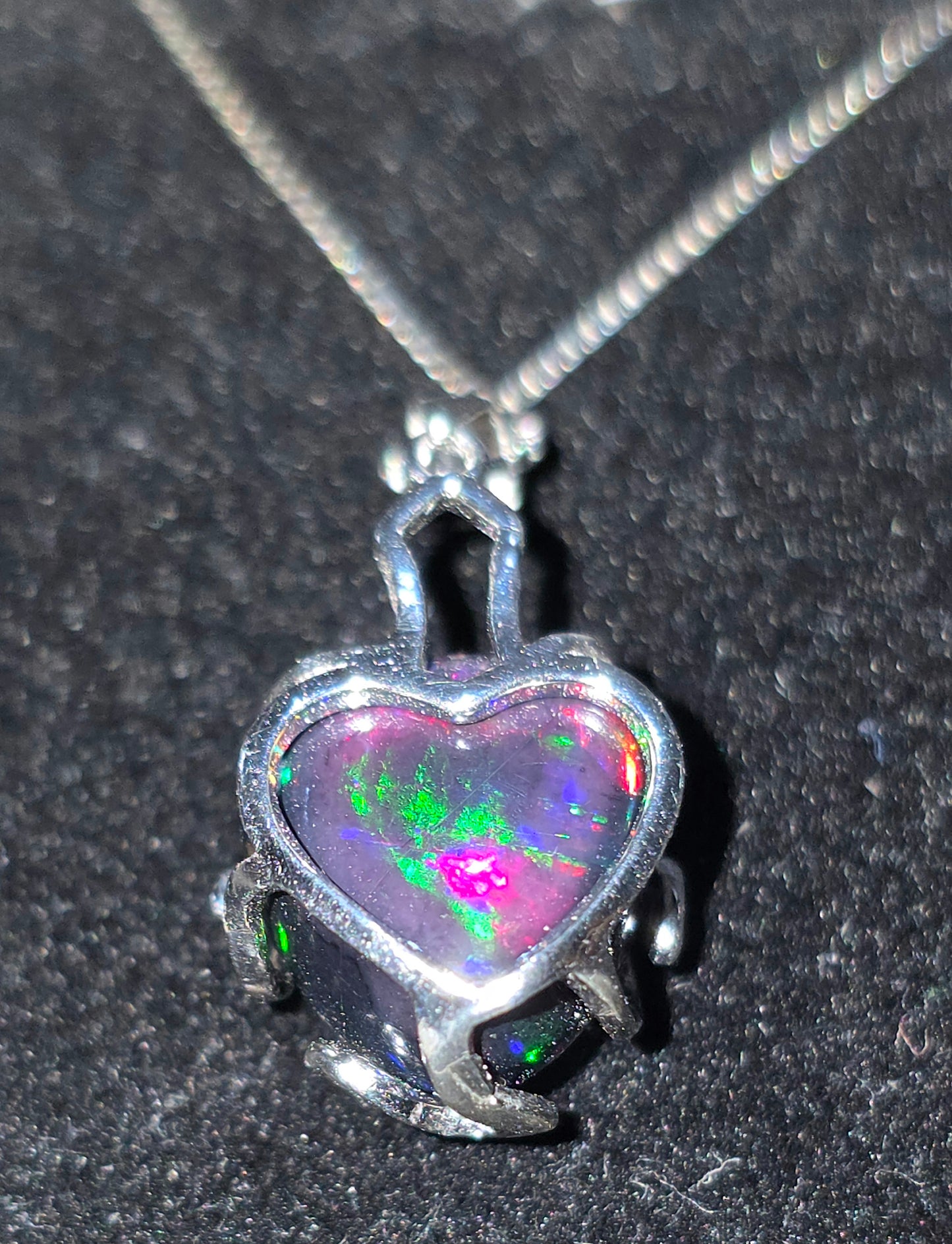 .925 Sterling Silver Necklace with a 7.76 Ct. DARK Ethiopian Opal with a beautiful play of color