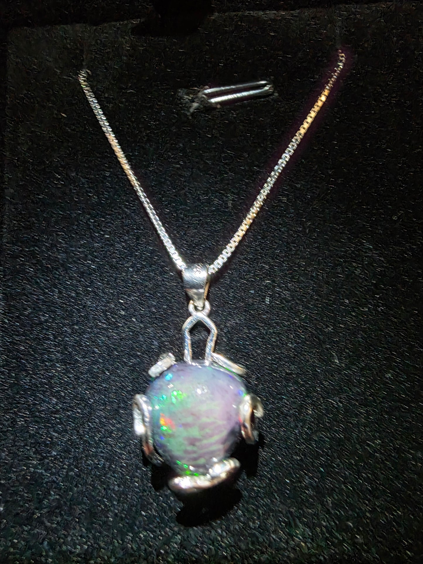 .925 Sterling Silver Necklace with a 7.76 Ct. DARK Ethiopian Opal with a beautiful play of color
