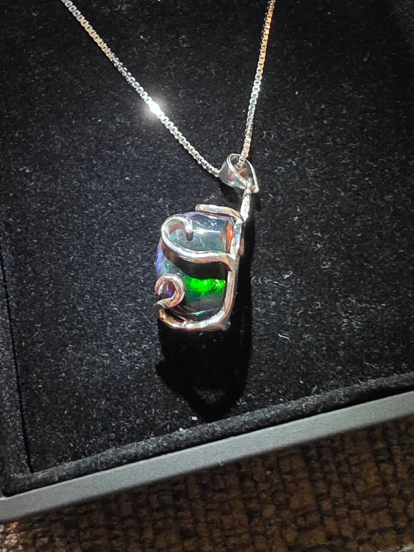 .925 Sterling Silver Necklace with a 7.76 Ct. DARK Ethiopian Opal with a beautiful play of color